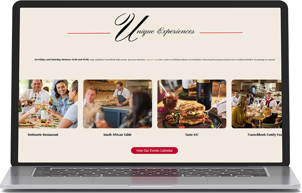 a laptop showing a wine estate microsite section titled unique experiences